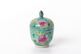 A TURQUOISE GROUND PORCELAIN COSMETIC JAR AND LID