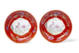 A PAIR OF CORAL GROUND FAMILLE ROSE PORCELAIN DISHES