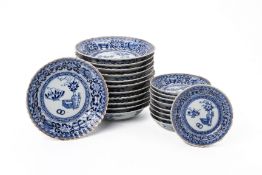 A QUANTITY OF BLUE AND WHITE PORCELAIN PLATES