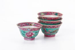 A SET OF FOUR TURQUOISE GROUND PORCELAIN BOWLS