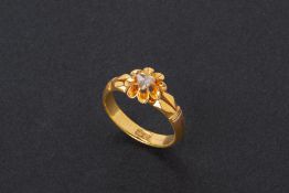 A GOLD AND INTAN RING