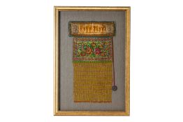 A FRAMED BEADED MIRROR COVER