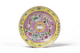 A PINK GROUND 'IN AND OUT' CIRCULAR DISH