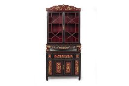 A PARCEL-GILT AND LACQUERED CABINET OF SMALL PROPORTIONS