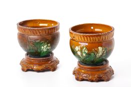 A PAIR OF JAPANESE BROWN AND GREEN GLAZED JARDINERES