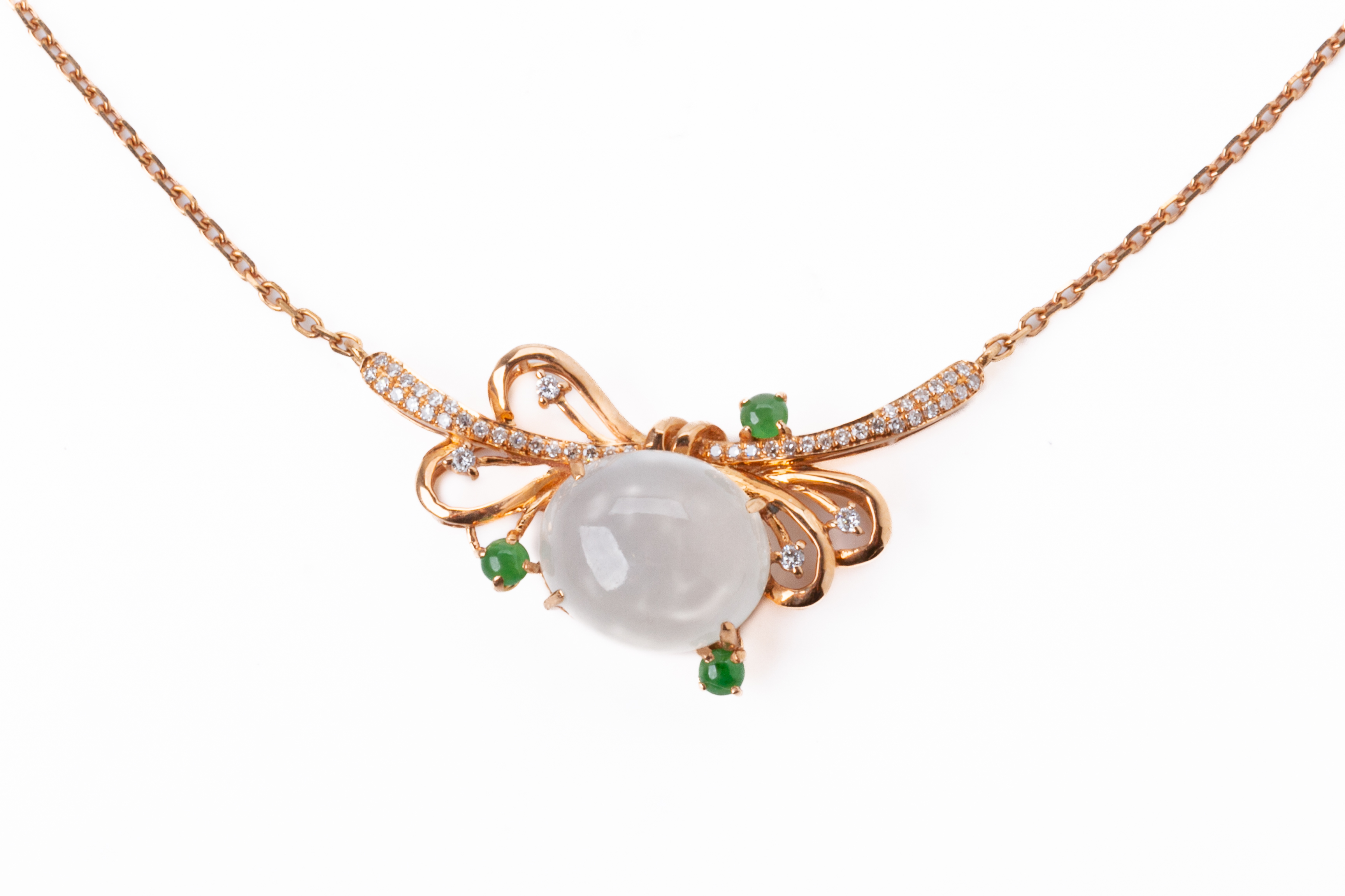 A JADE AND DIAMOND PENDANT NECKLACE