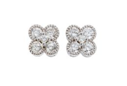 A PAIR OF DIAMOND STUD EARRINGS