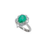 AN EMERALD AND DIAMOND RING