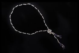 A CULTURED PEARL AND IOLITE LARIAT NECKLACE
