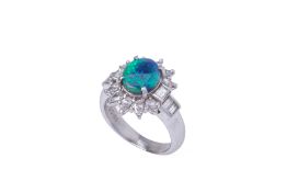 A BLACK OPAL AND DIAMOND CLUSTER RING