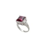 A GARNET AND DIAMOND RING