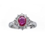 A RUBY AND DIAMOND CLUSTER RING