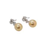 A PAIR OF SOUTH SEA CULTURED PEARL AND DIAMOND EARRINGS