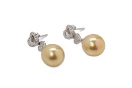 A PAIR OF SOUTH SEA CULTURED PEARL AND DIAMOND EARRINGS