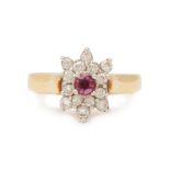 A RUBY AND DIAMOND CLUSTER RING