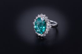 AN APATITE AND DIAMOND CLUSTER RING