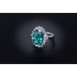 AN APATITE AND DIAMOND CLUSTER RING