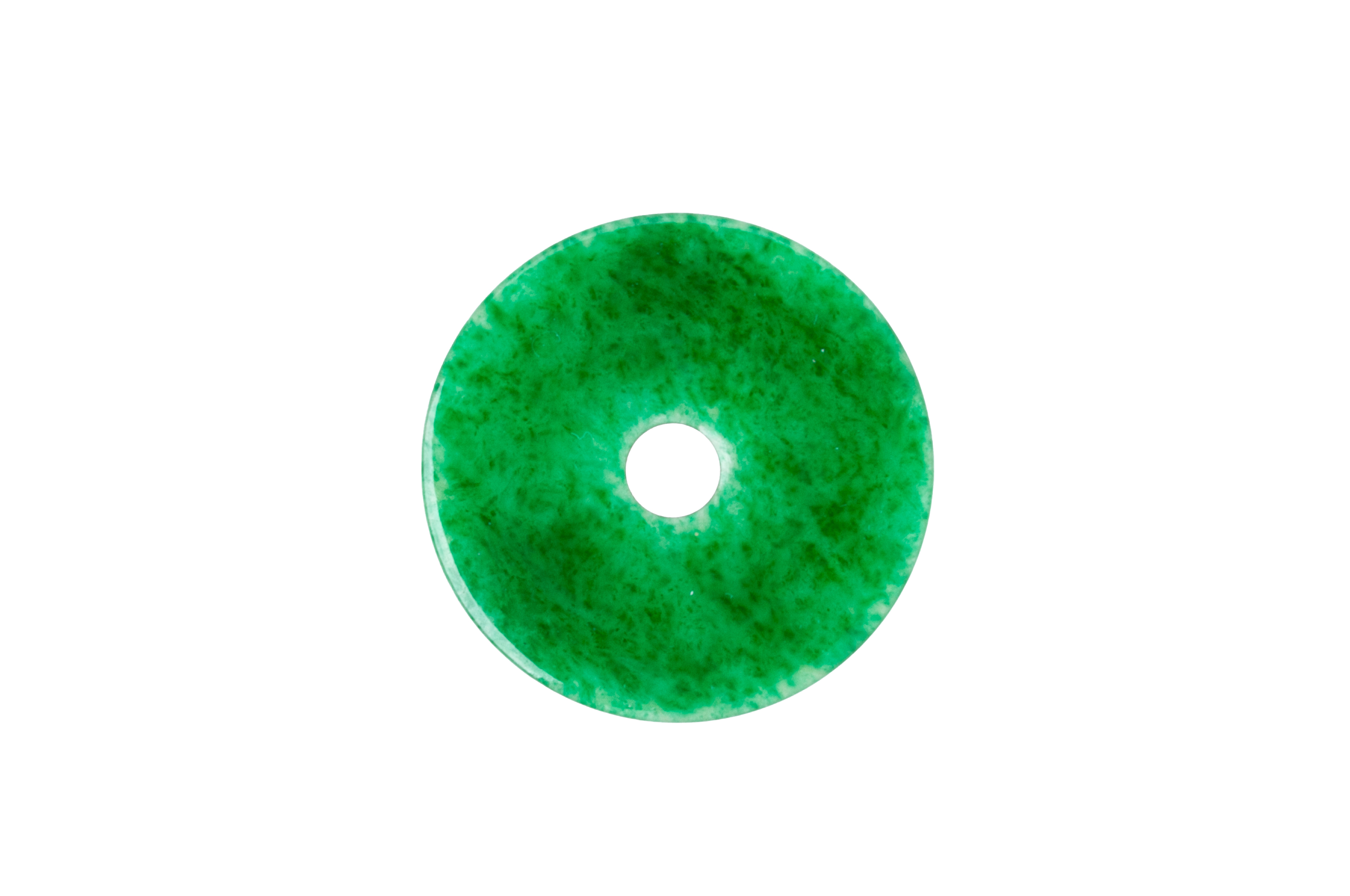 A GREEN JADE PIERCED DISC