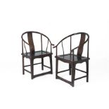 A PAIR OF CHINESE HORSESHOE BACKED ARMCHAIRS