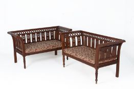 A PAIR OF CARVED WOOD BENCHES