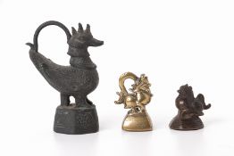 TWO SOUTHEAST ASIAN BRONZE OPIUM WEIGHTS
