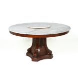 A LARGE CIRCULAR MARBLE TOPPED DINING / HALL TABLE