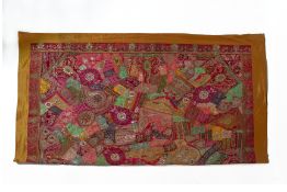 A LARGE INDIAN EMBROIDERED BED COVER