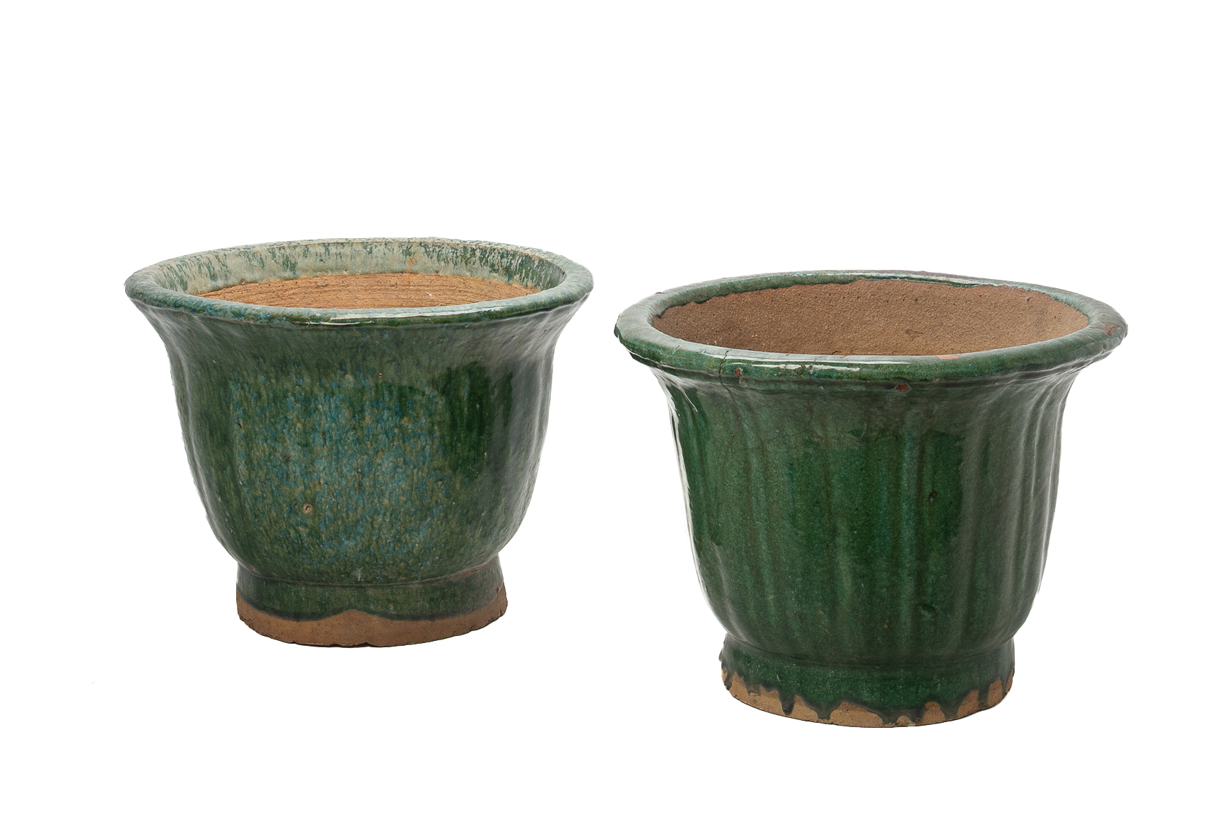 A PAIR OF GREEN GLAZED CERAMIC GARDEN POTS