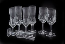 A SET OF CUT CRYSTAL WINE AND CHAMPAGNE GLASSES