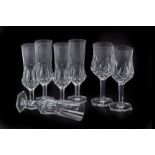 A SET OF CUT CRYSTAL WINE AND CHAMPAGNE GLASSES