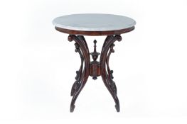 A MARBLE TOPPED CIRCULAR OCCASSIONAL TABLE