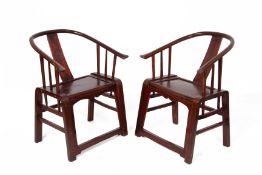 A PAIR OF CHINESE PROVINCIAL HORSESHOE BACK ARMCHAIRS