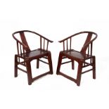 A PAIR OF CHINESE PROVINCIAL HORSESHOE BACK ARMCHAIRS