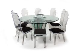 A GLASS TOPPED TABLE AND EIGHT DINING CHAIRS BY KESTERPORT