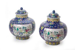 A PAIR OF CHINESE ENAMELLED PORCELAIN VASES