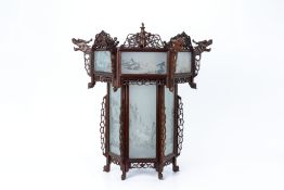 A CHINESE CARVED WOOD AND REVERSE GLASS PAINTED LANTERN