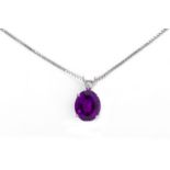 AN AMETHYST PENDANT ON CHAIN