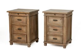 A PAIR OF RUSTIC WOODEN BEDSIDE TABLES