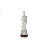 A LARGE BLANC DE CHINE MODEL OF GUANYIN