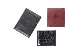 A GROUP OF LEATHER WALLETS