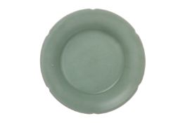 A CELADON LOBED SMALL CIRCULAR DISH OR WASHER