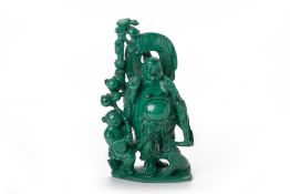 A CARVED MALACHITE FIGURE OF BUDAI