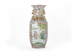 A FAMILLE ROSE TWIN HANDLED PORCELAIN VASE