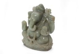 A LARGE CARVED JADE MODEL OF GANESH