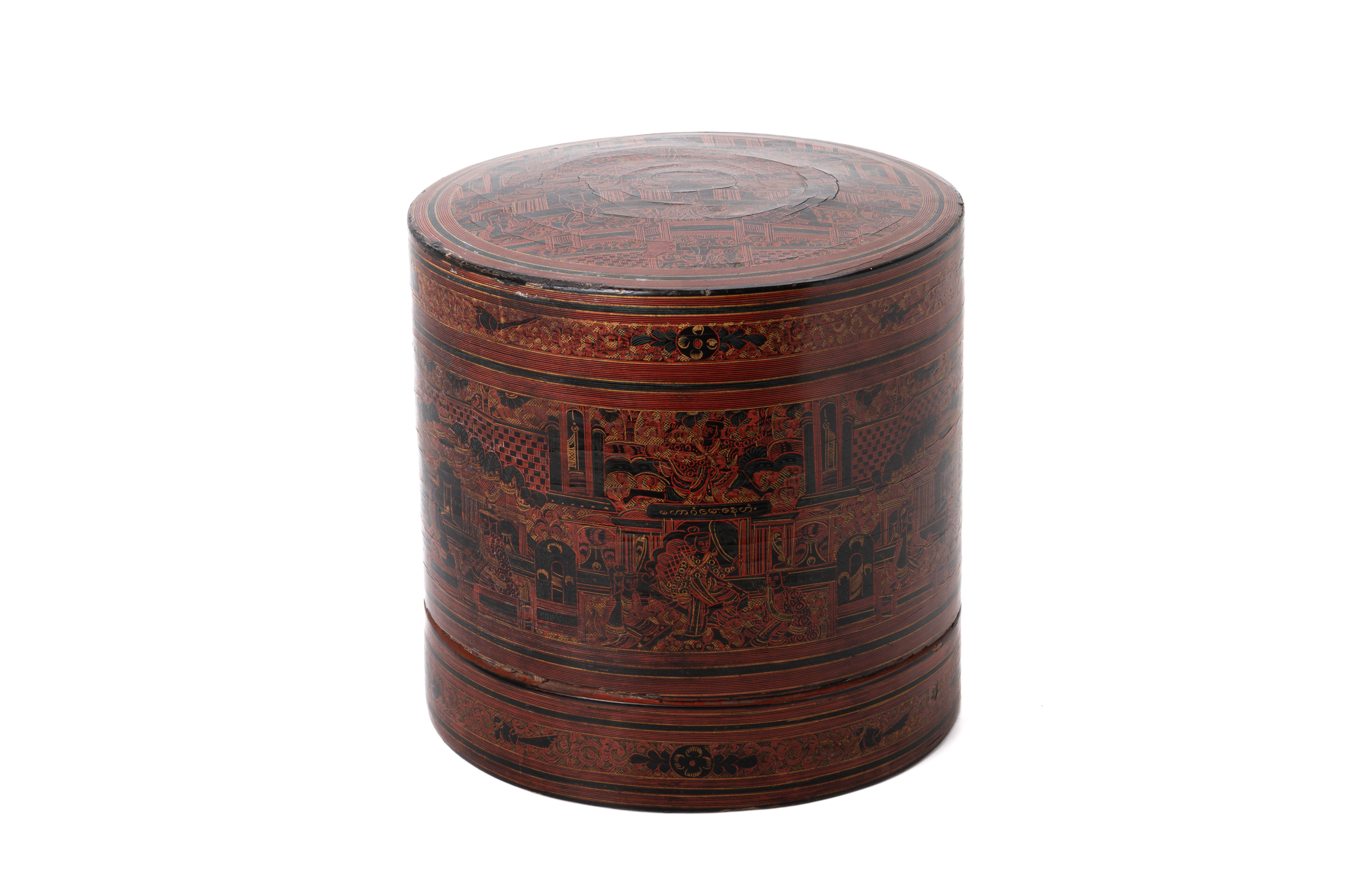 A BURMESE RED LACQUER CYLINDRICAL BETEL BOX