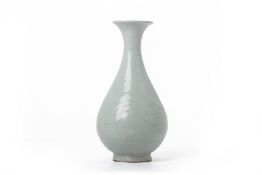 A MOULDED PEAR SHAPED BOTTLE VASE