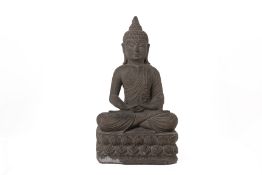 A SOUTHEAST ASIAN CARVED STONE BUDDHA