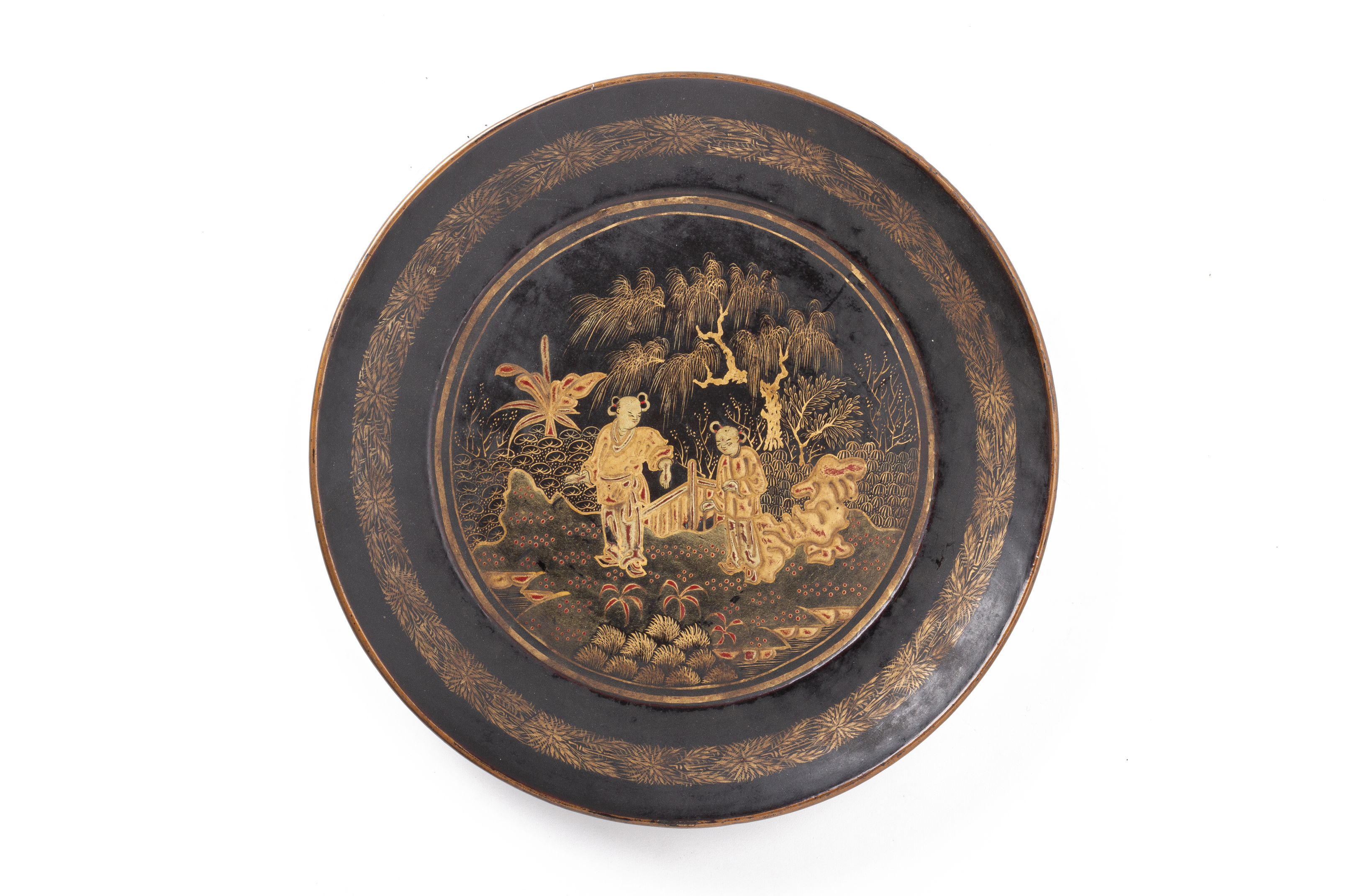 A CHINESE GILT AND BLACK LACQUER SMALL DISH