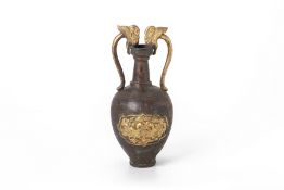 A PARCEL GILT COPPER TWIN HANDLED VASE