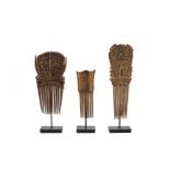 A SET OF THREE SOUTHEAST ASIAN CARVED WOOD COMBS